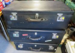 Three vintage globe trotter suitcases