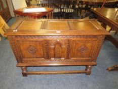 A carved oak coffer - W 106 cm
