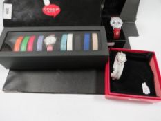 A cased Butler & Wilson wrist watch together with a Butler & Wilson cocktail watch and a Gossip