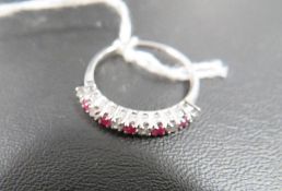 A hallmarked 9 carat white gold ruby and diamond ring approx. weight 1.6g