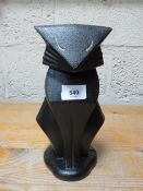 An Art Deco cat doorstop **