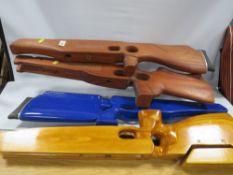 Four crossbow type wooden stocks