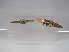 A 9ct gold bar brooch approx. weight. 2.4g together with a 925 silver example