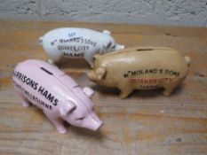 Three pig moneybanks **