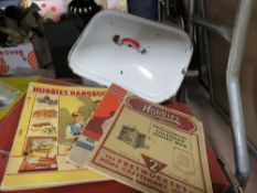 An enamel bread bin, lockable enamelled metal box, brass beer taps etc