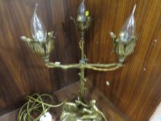 A gilt metal brass lamp base with Deco style semi-nude figure with a fawn at the base of a tree with
