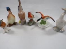 Six assorted bird figures to include Royal Worcester and Royal Copenhagen