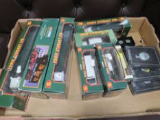 A tray of Eddie Stobart collectables to include pocket watches