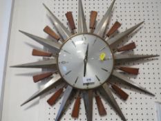 A retro metamec sunburst wall clock A/F