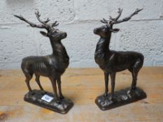 Two deer figures **