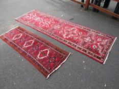 Two handmade Middle Eastern carpet runners - longest 319 cm x 94 cm