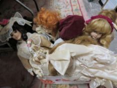 A box of collectable dolls