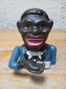 A smiling Sam moneybank **