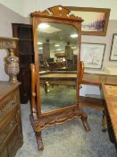 A large carved Edwardian / Victorian mahogany cheval mirror