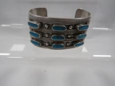 A 925 silver and turquoise cuff bangle