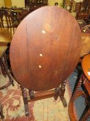 A vintage oak barleytwist tilt top table / screen together with and two small oak tables (3)