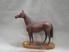 A Beswick figure of a horse on plinth - Red Rum