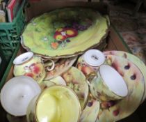 A box of hand painted signed dinnerware