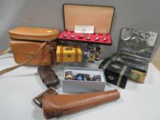 A tray of collectables to include band figures, collectable boxes, cameras etc