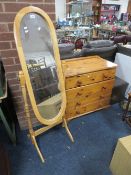 A honey pine four drawer chest together with a modern cheval mirror
