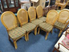 A set of six modern bergere restaurant chairs