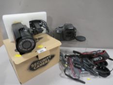 A selection of camera equipment, security camera etc