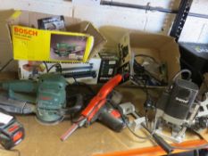 Boxed power tools to include a Bosch sander, a Trend router with accessories and a Black & Decker