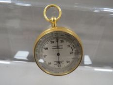 A pocket barometer by Short & Mason of London
