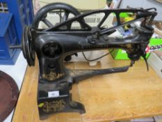 An antique Singer leather working machine