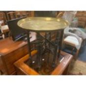 A brass topped Eastern table