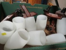 A tray of retro wall light fittings and shades