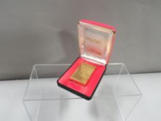 A vintage 'Myon, King O Flam' gold plated cigarette lighter in original fitted box
