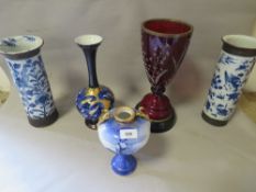 A selection of vases to include Royal Doulton