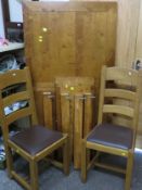 A modern extending dining table and chairs