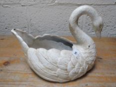 A cast iron swan planter**