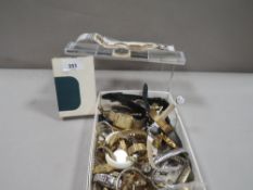 A Ronson cigarette lighter and a quantity of wristwatches