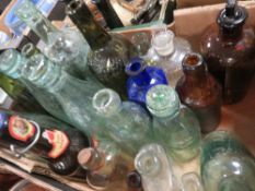 A small tray of assorted collectable bottles