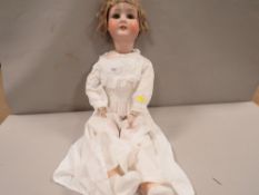 A vintage doll A/F