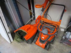 An electric Flymo lawnmower and a strimmer
