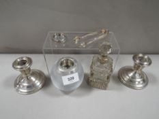 A selection of hallmarked silver and white metal collectables to include silver banded perfume