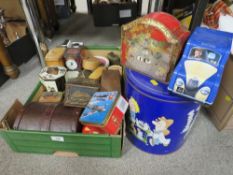 A tray of collectable tins to include a George Basset calendar example together with a tray of