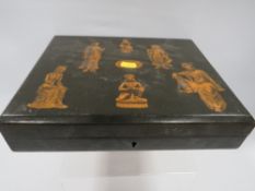 An Asian themed lacquer box