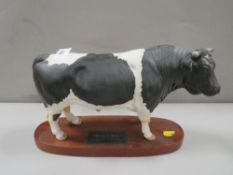 A large Beswick Friesian bull on stand