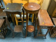 An Edwardian jardiniaire stand together with another stand and an Edwardian table. (3)