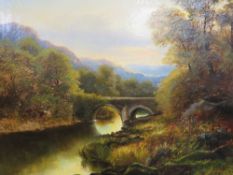 A large 19th century gilt framed oil on canvas depicting a river scene 62 x 74 cm