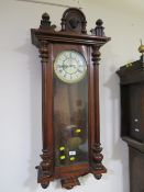 An antique Vienna wall clock with twin brass weights H 112 cm