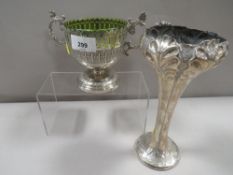 A silver plated twin handle sugar bowl with lime green glass holder together with a silver plated