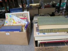 Four trays of books and annuals, newspapers etc to include Rupert