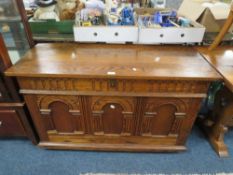 A reproduction Adam Bede carved oak coffer W 117 cm