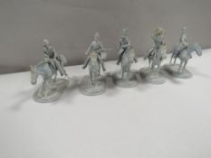 A collection of five metal assorted army figures on horseback A/F